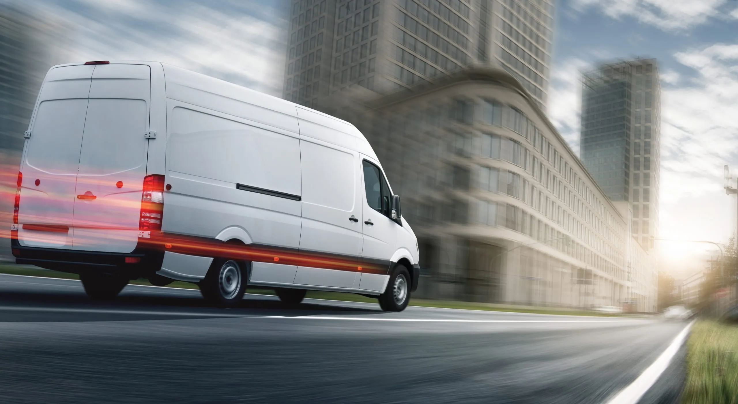 Commercial delivery vehicle traveling on a highway