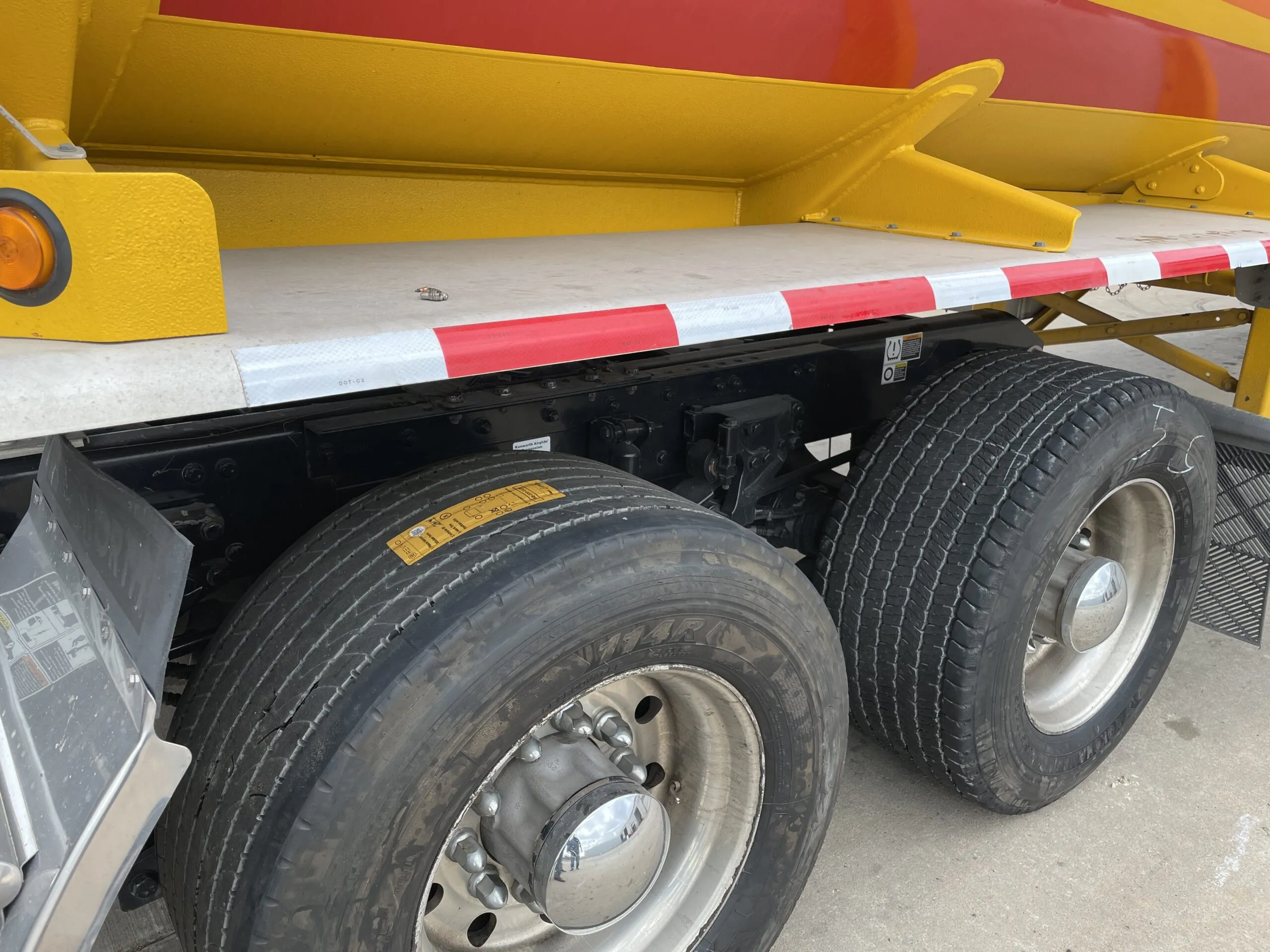 Commercial truck tires and wheel assemblies in a fleet yard