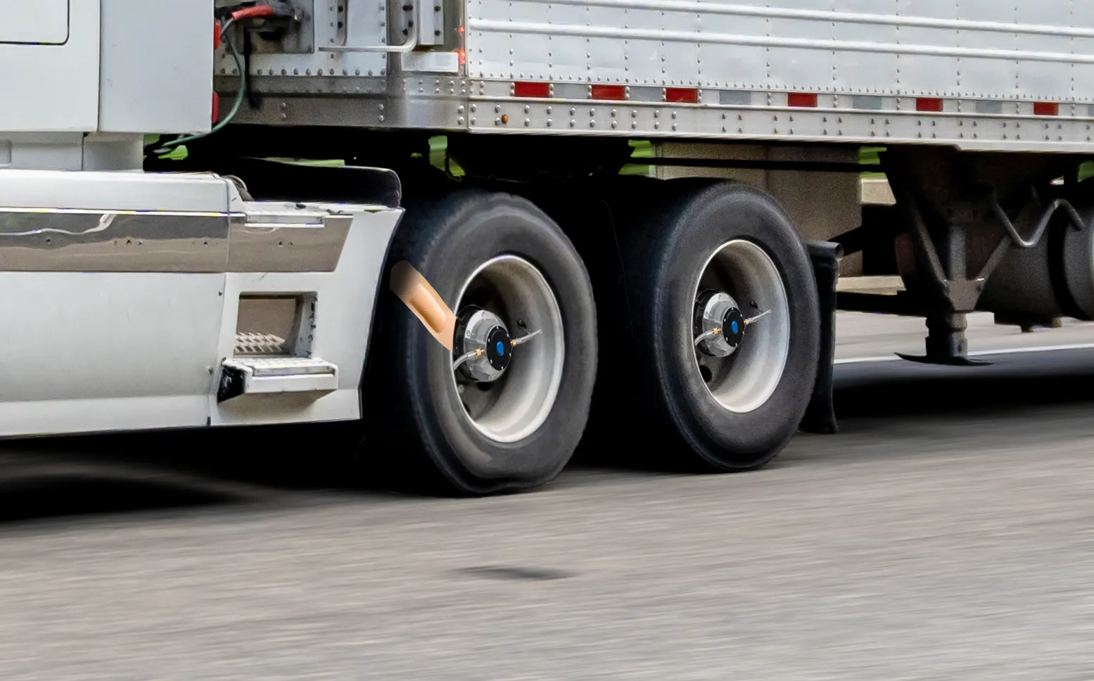 Truck wheels with an automatic tire inflation system and a bandage illustration
